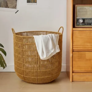 cn-11134207-820l4-mpbz3w7qvhfvd6.webp Bakul Baju Rattan Cylinder Style with Handle Modern Metal Frame Laundry Organiser