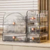 cn-11134207-820l4-ms3wuxxpnbpc0e.webp Cosmetic Storage Box Desktop High End Feeling Anti dust Transparent Acrylic Dressing Table Lipstick Skin Care Product Shelf