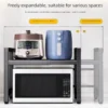 my-11134207-820l6-mqr16tsfwr2a27.webp Multifunctional Microwave Oven Rack Adjustable Iron Kitchen Storage Shelf Stand for Rice Cooker Oven